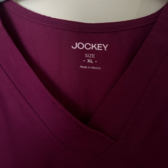 ockey Women's Classic Fit Tri Blend Solid Scrub Top XL Plumberry - Picture 3 of 3